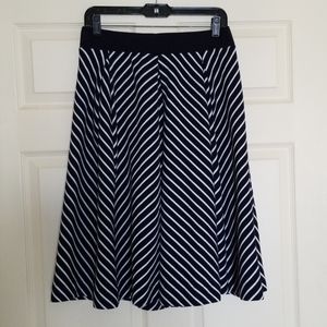 Philosophy stripped below the knee skirt